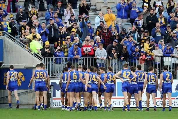 Gamer Jeremy McGovern of the Eagles leads the team off the field after the win during the 2021 AFL Round 19 match between the West Coast Eagles and...
