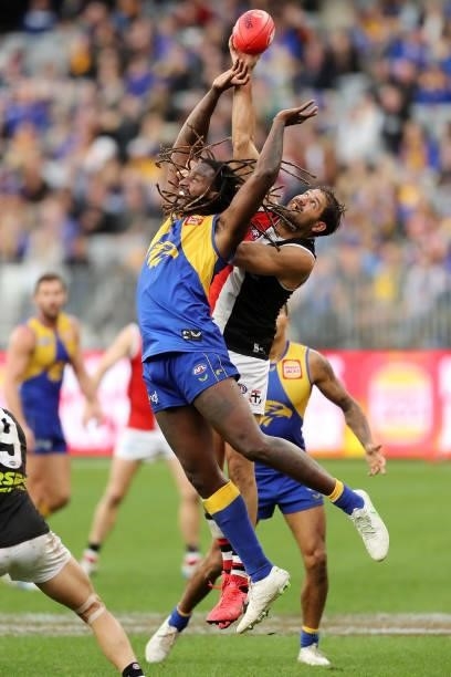 Nic Naitanui of the Eagles and Paddy Ryder in action during the 2021 AFL Round 19 match between the West Coast Eagles and the St Kilda Saints at...