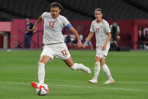 Canada's forward Christine Sinclair shoots and fails to score during the Tokyo 2020 Olympic Games women's group E first round football match between...
