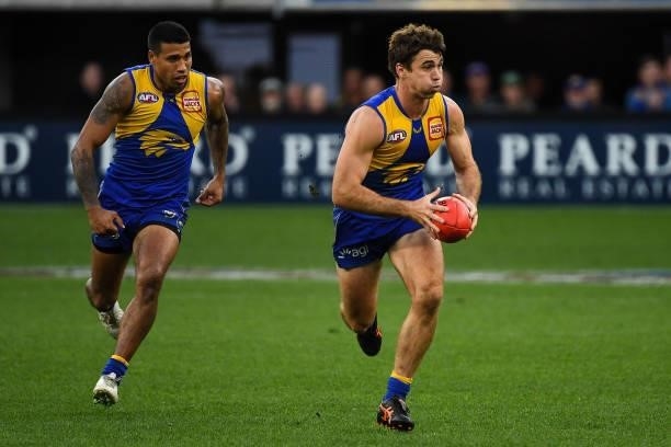 Jamie Cripps of the Eagles runs with the ball during the 2021 AFL Round 19 match between the West Coast Eagles and the St Kilda Saints at Optus...