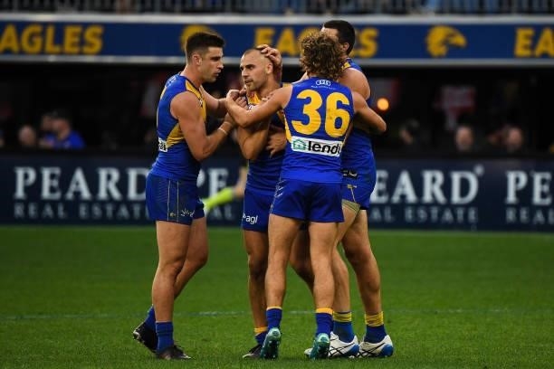 Dom Sheed and Josh J. Kennedy of the Eagles celebrate a late goal during the 2021 AFL Round 19 match between the West Coast Eagles and the St Kilda...