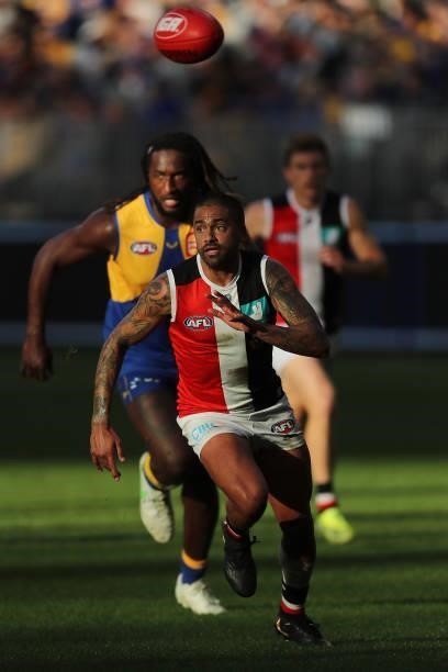 Bradley Hill of the Saints chases the ball during the 2021 AFL Round 19 match between the West Coast Eagles and the St Kilda Saints at Optus Stadium...