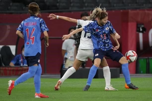 Japan's midfielder Yuzuho Shiokoshi controls the ball during the Tokyo 2020 Olympic Games women's group E first round football match between Japan...