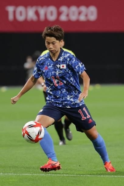 Japan's forward Mina Tanaka controls the ball during the Tokyo 2020 Olympic Games women's group E first round football match between Japan and...