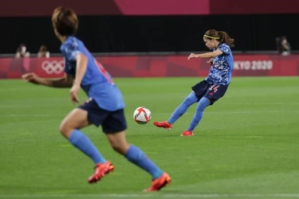 Japan's midfielder Yui Hasegawa shoots and fails to score during the Tokyo 2020 Olympic Games women's group E first round football match between...