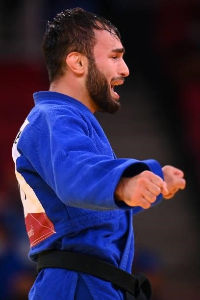 France's Luka Mkheidze celebrates winning the judo men's -60kg bronze medal B bout against South Korea's Kim Won Jin during the Tokyo 2020 Olympic...