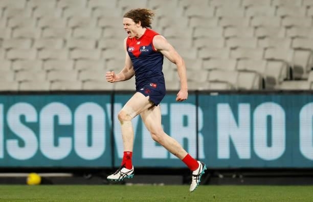 Ben Brown of the Demons celebrates a goal during the 2021 AFL Round 19 match between the Melbourne Demons and the Western Bulldogs at the Melbourne...