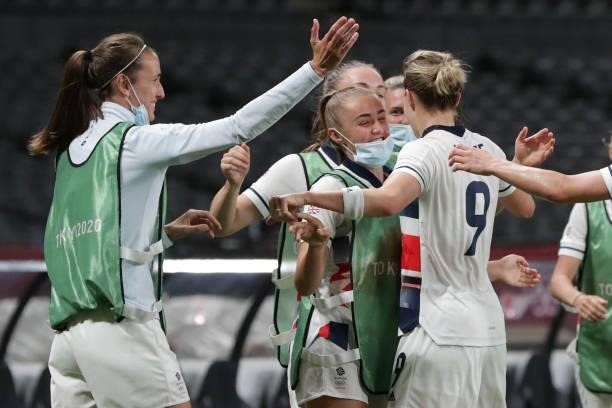 Britain's forward Ellen White celebrates with teammates after scoring a goal during the Tokyo 2020 Olympic Games women's group E first round football...