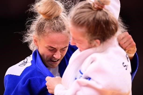 Israel's Shira Rishony competes with Ukraine's Daria Bilodid during their judo women's -48kg bronze medal A bout during the Tokyo 2020 Olympic Games...