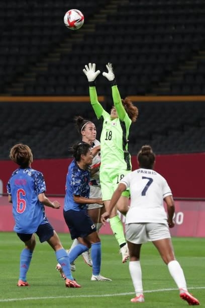 Japan's goalkeeper Ayaka Yamashita makes a save during the Tokyo 2020 Olympic Games women's group E first round football match between Japan and...