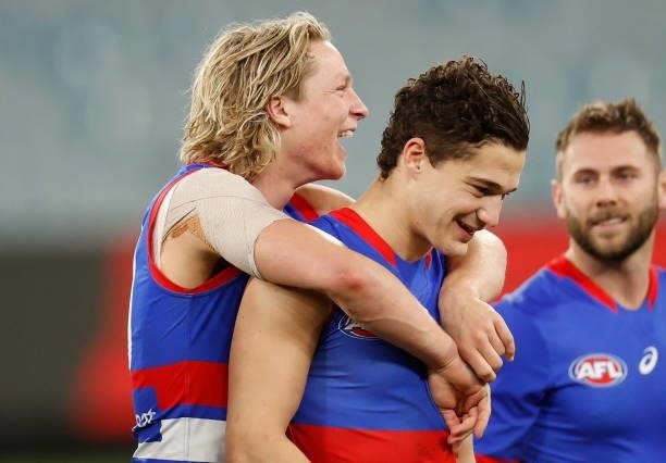 Cody Weightman and Riley Garcia of the Bulldogs celebrate during the 2021 AFL Round 19 match between the Melbourne Demons and the Western Bulldogs at...