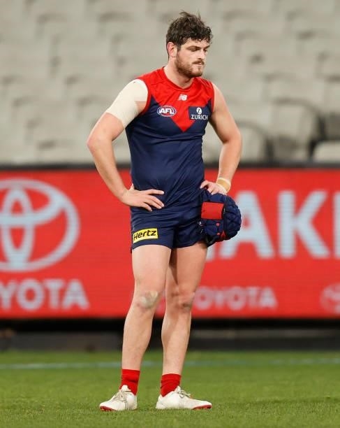 Angus Brayshaw of the Demons looks dejected after a loss during the 2021 AFL Round 19 match between the Melbourne Demons and the Western Bulldogs at...