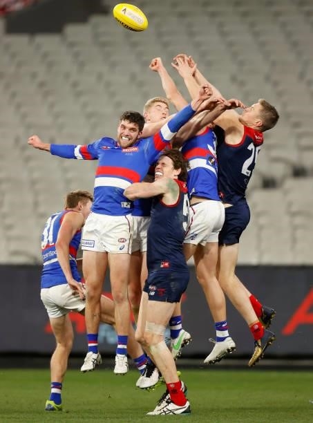 Bailey Williams of the Bulldogs, Tim English of the Bulldogs, Ben Brown of the Demons and Tom McDonald of the Demons during the 2021 AFL Round 19...