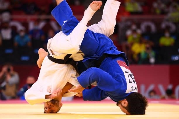 Netherlands' Tornike Tsjakadoea competes with Kazakhstan's Yeldos Smetov during their judo men's -60kg bronze medal A bout during the Tokyo 2020...