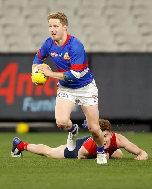 Lachie Hunter of the Bulldogs in action during the 2021 AFL Round 19 match between the Melbourne Demons and the Western Bulldogs at the Melbourne...