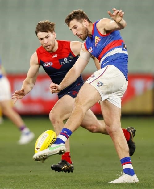 Marcus Bontempelli of the Bulldogs kicks the ball during the 2021 AFL Round 19 match between the Melbourne Demons and the Western Bulldogs at the...