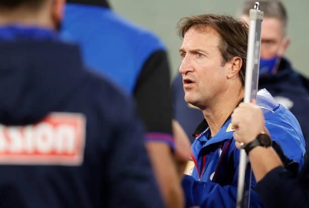 Luke Beveridge, Senior Coach of the Bulldogs addresses his players \during the 2021 AFL Round 19 match between the Melbourne Demons and the Western...