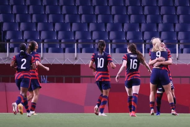 S midfielder Lindsey Horan celebrates with teammates after scoring the second goal during the Tokyo 2020 Olympic Games women's group G first round...
