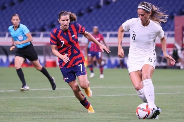 New Zealand's defender Abby Erceg is marked by USA's forward Tobin Heath during the Tokyo 2020 Olympic Games women's group G first round football...