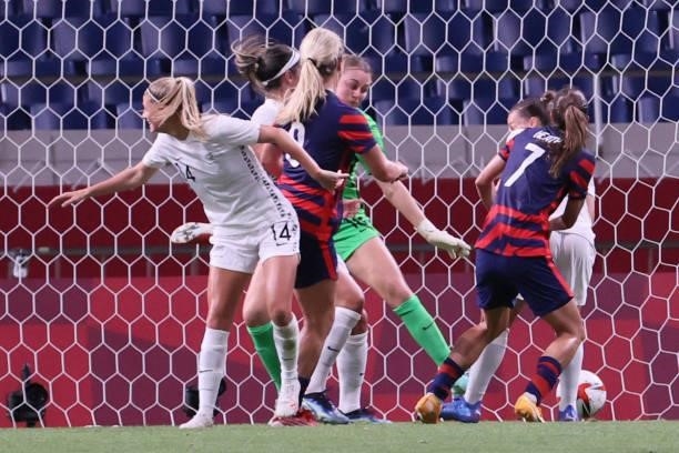 S midfielder Lindsey Horan scores the second goal during the Tokyo 2020 Olympic Games women's group G first round football match between New Zealand...