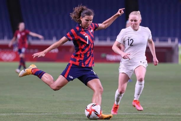 S forward Tobin Heath attempts a shot during the Tokyo 2020 Olympic Games women's group G first round football match between New Zealand and USA at...