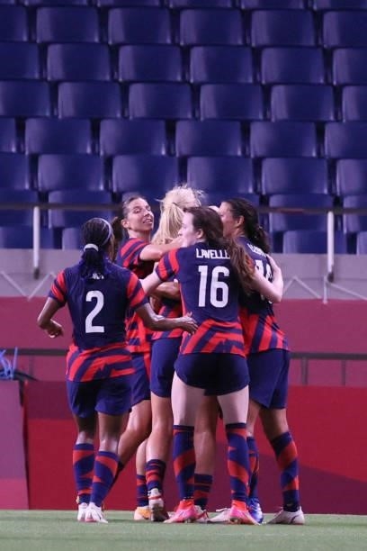 S players celebrate their second goal during the Tokyo 2020 Olympic Games women's group G first round football match between New Zealand and USA at...
