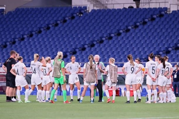 New Zealand's coach Tom Sermanni speaks to his players after the Tokyo 2020 Olympic Games women's group G first round football match between New...