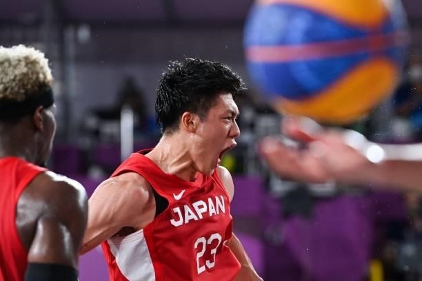 Japan's Ryuto Yasuoka celebrates at the end of the men's first round 3x3 basketball match between Belgium and Japan at the Aomi Urban Sports Park in...
