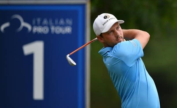 Lukas Nemecz from Austria plays his first shot on the 1st hole during the Day Three of Italian Challenge at Margara Golf Club on July 24, 2021 in...