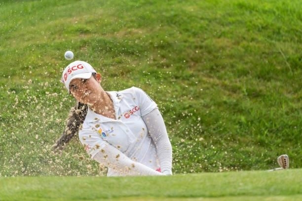 Pajaree Anannarukarn of Thailand plays a shot from bunker during day three of the The Amundi Evian Championship at Evian Resort Golf Club on July 24,...