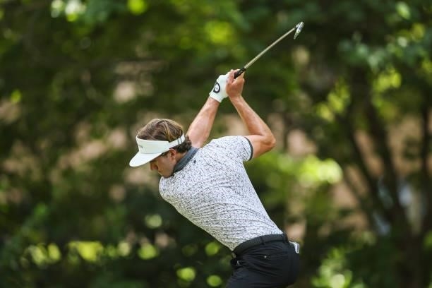 James Nicholas plays his shot from the 12th tee during the third round of the Price Cutter Charity Championship presented by Dr. Pepper at Highland...