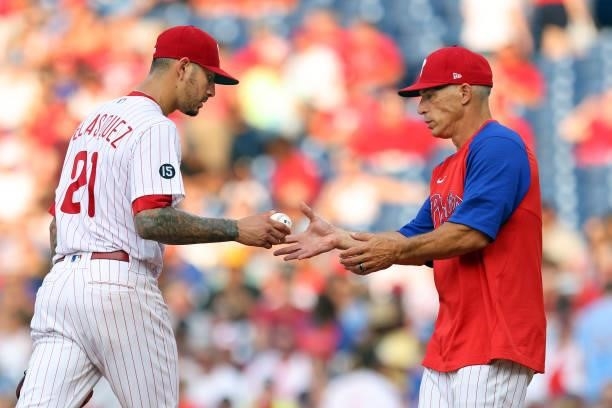 Manager Joe Girardi of the Philadelphia Phillies takes the ball from pitcher Vince Velasquez during the third inning of a game against the Atlanta...