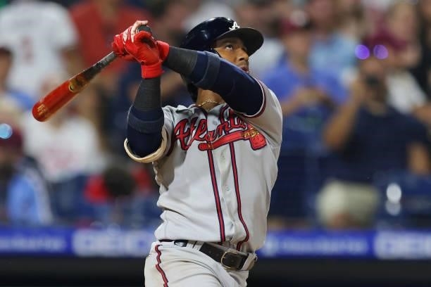 Ozzie Albies of the Atlanta Braves hits a three-run home run during the eighth inning against the Philadelphia Phillies at Citizens Bank Park on July...
