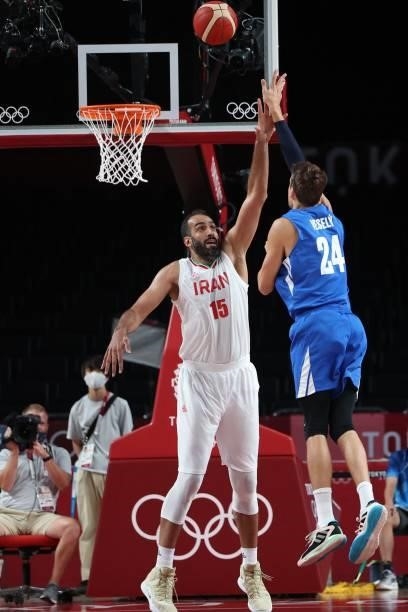 Czech Republic's Jan Vesely goes to the basket as Iran's Hamed Haddadi tries to block in the men's preliminary round group A basketball match between...