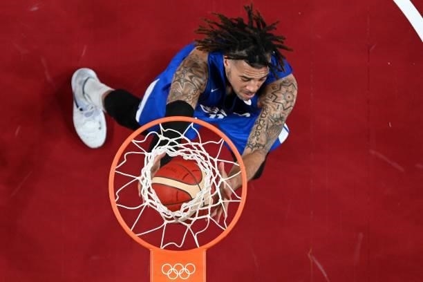 Czech Republic's Blake Schilb goes to the basket in the men's preliminary round group A basketball match between Iran and Czech Republic during the...