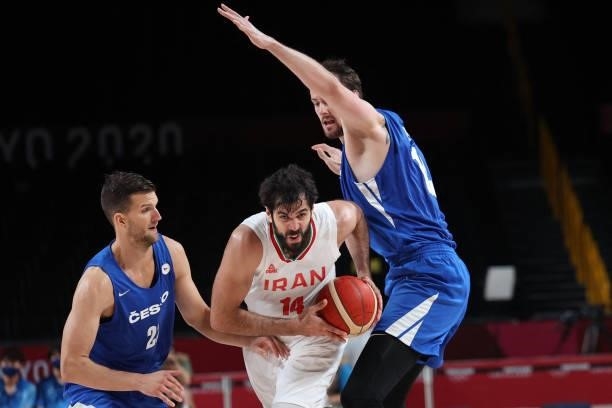 Iran's Mohammadsamad Nik Khahbahrami runs with the ball in the men's preliminary round group A basketball match between Iran and Czech Republic...