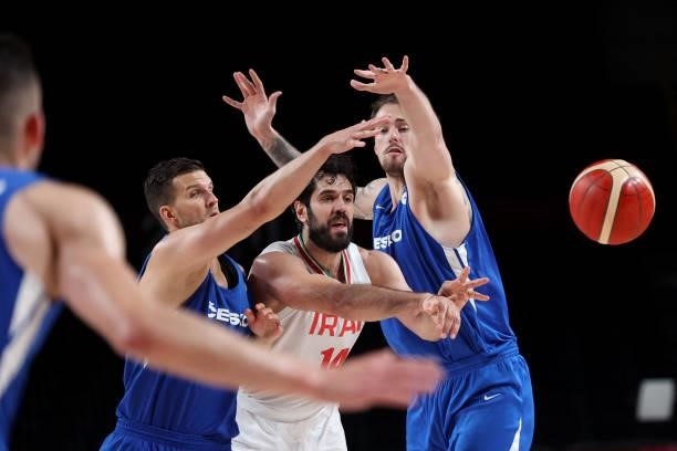 Iran's Mohammadsamad Nik Khahbahrami passes the ball in the men's preliminary round group A basketball match between Iran and Czech Republic during...