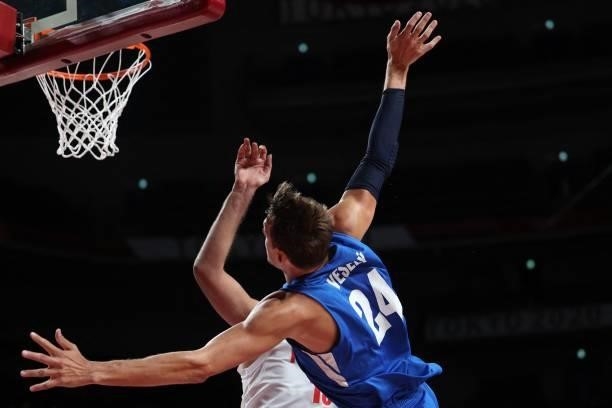 Czech Republic's Jan Vesely jumps for the ball in the men's preliminary round group A basketball match between Iran and Czech Republic during the...