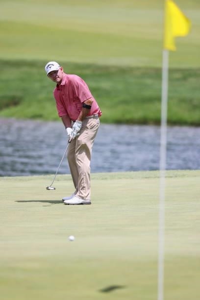 Tommy Gainey putts on the 8th green during the third round of the Price Cutter Charity Championship presented by Dr. Pepper at Highland Spring...
