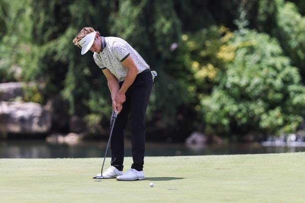 James Nicholas putts on the 8th green during the third round of the Price Cutter Charity Championship presented by Dr. Pepper at Highland Spring...
