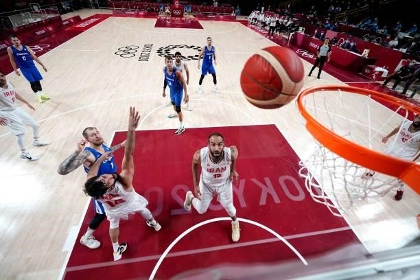Czech Republic's Patrik Auda throws the ball to the basket in the men's preliminary round group A basketball match between Iran and Czech Republic...