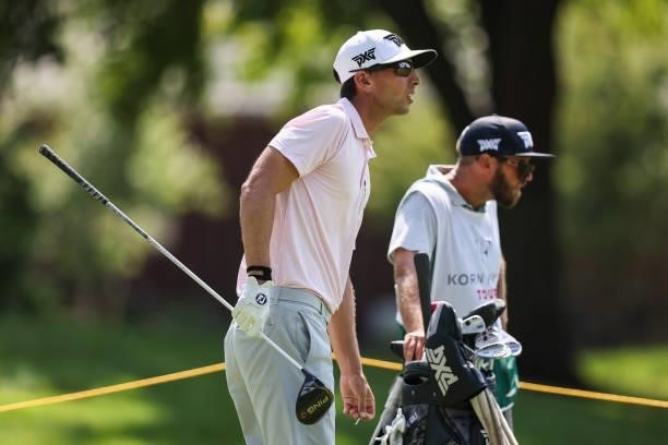 Seth Reeves looks on with his caddie from the 17th tee during the third round of the Price Cutter Charity Championship presented by Dr. Pepper at...