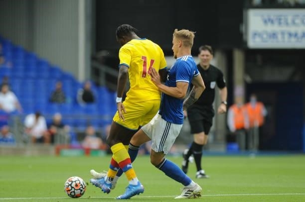Ipswichs Luke Woolfenden tackles Crystal Palaces Jean-Phillipe Mateta during the Pre-season Friendly match between Ipswich Town and Crystal Palace at...