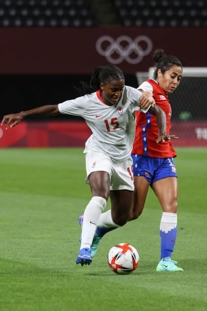 Nichelle PRINCE of Team Canada battles for possession with Yessenia LOPEZ of Team Chile during the Women's First Round Group E match between Chile...