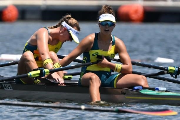 Australia's Amanda Bateman and Australia's Tara Rigney react after the women's double sculls semi-final during the Tokyo 2020 Olympic Games at the...