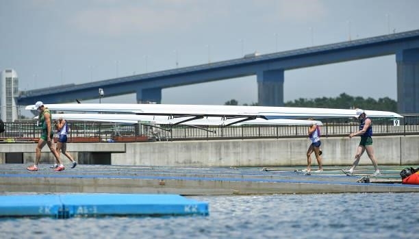 Tokyo , Japan - 25 July 2021; Philip Doyle, left, and Ronan Byrne of Ireland leave the course after finishing last in the Men's Double Skulls...