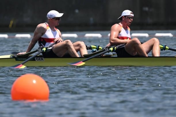 Germany's Stepan Krueger and Germany's Marc Weber react after the men's double sculls semi-final during the Tokyo 2020 Olympic Games at the Sea...