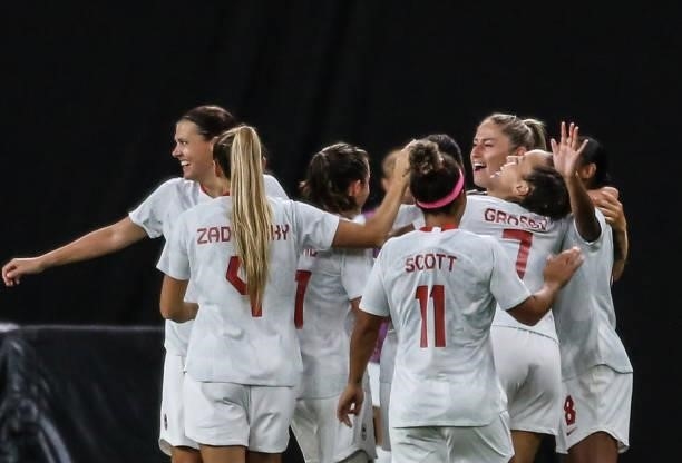 Janine BECKIE of Team Canada celebrating with a second goal with teammates during the Women's First Round Group E match between Chile and Canada on...