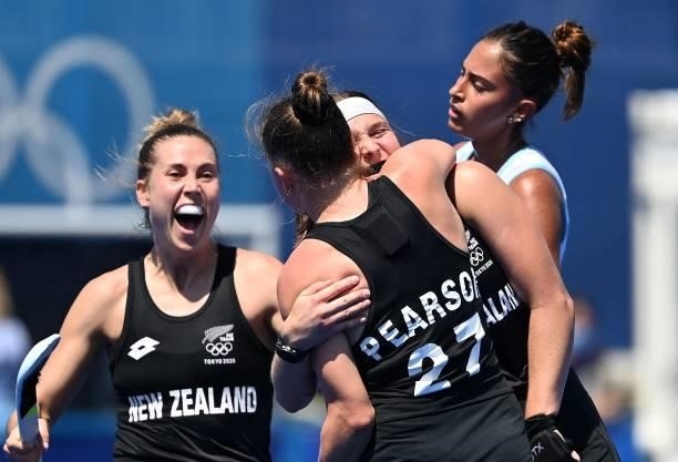 New Zealand's Holly Pearson celebrates with teammates as after scoring against Argentina as Argentina's Valentina Raposo Ruiz De Los Llanos reacts...