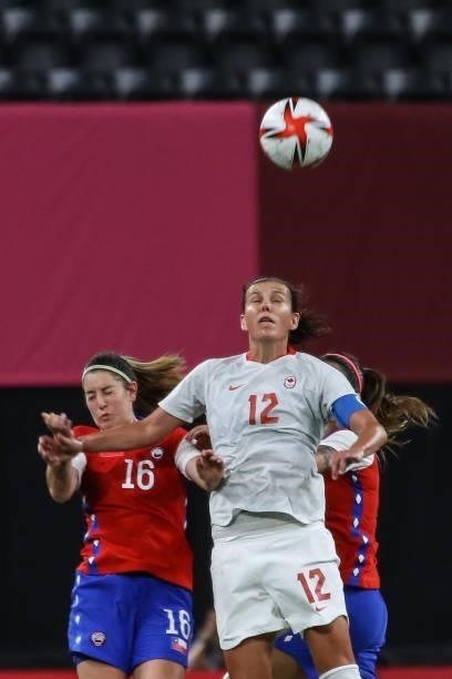 Christine SINCLAIR of Team Canada battles for possession with Daniela ZAMORA Rosario BALMACEDA of Team Chile during the Women's First Round Group E...
